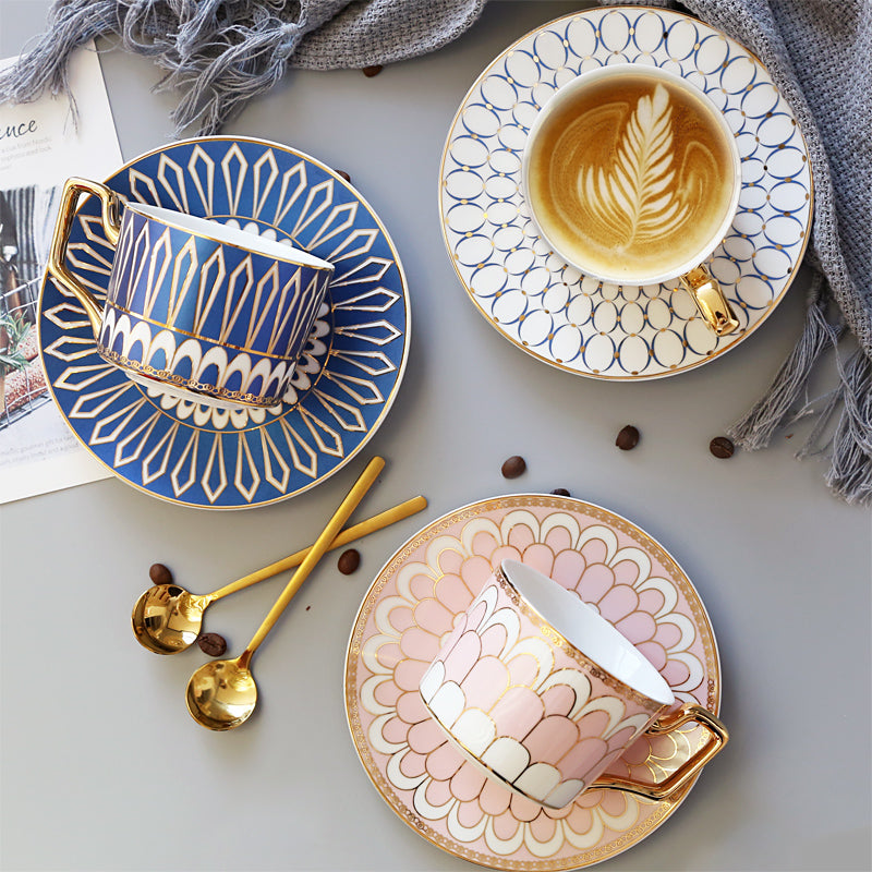 Patterned Tea Cup Set with Golden Handles and Saucer
