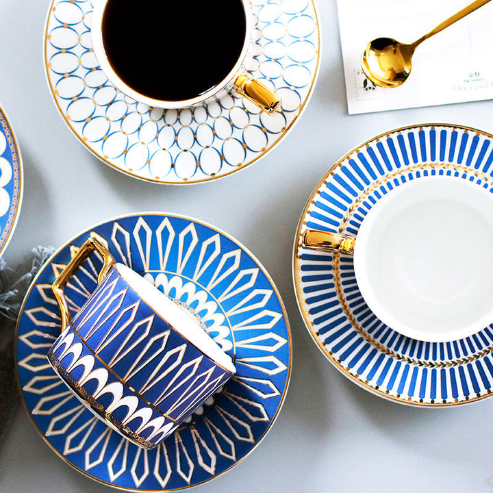 Patterned Tea Cup Set with Golden Handles and Saucer