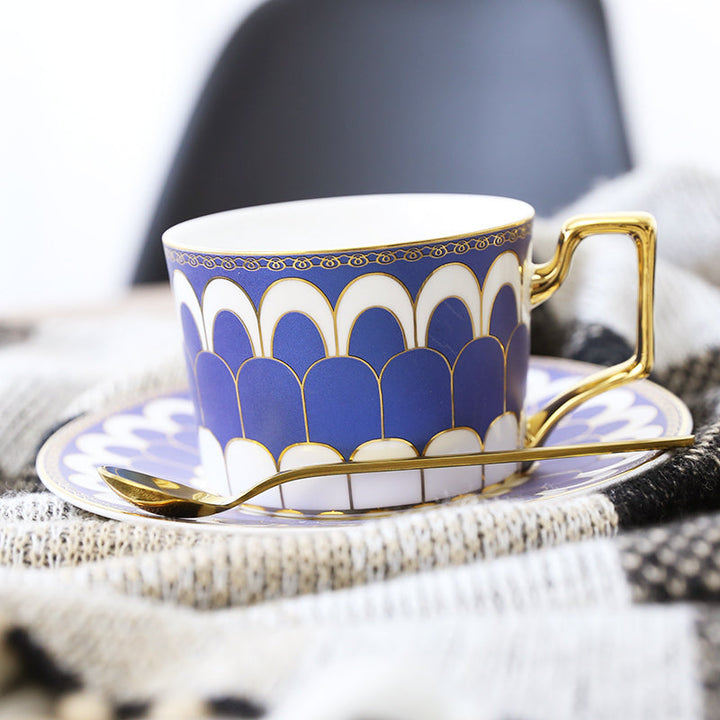 Patterned Tea Cup Set with Golden Handles and Saucer