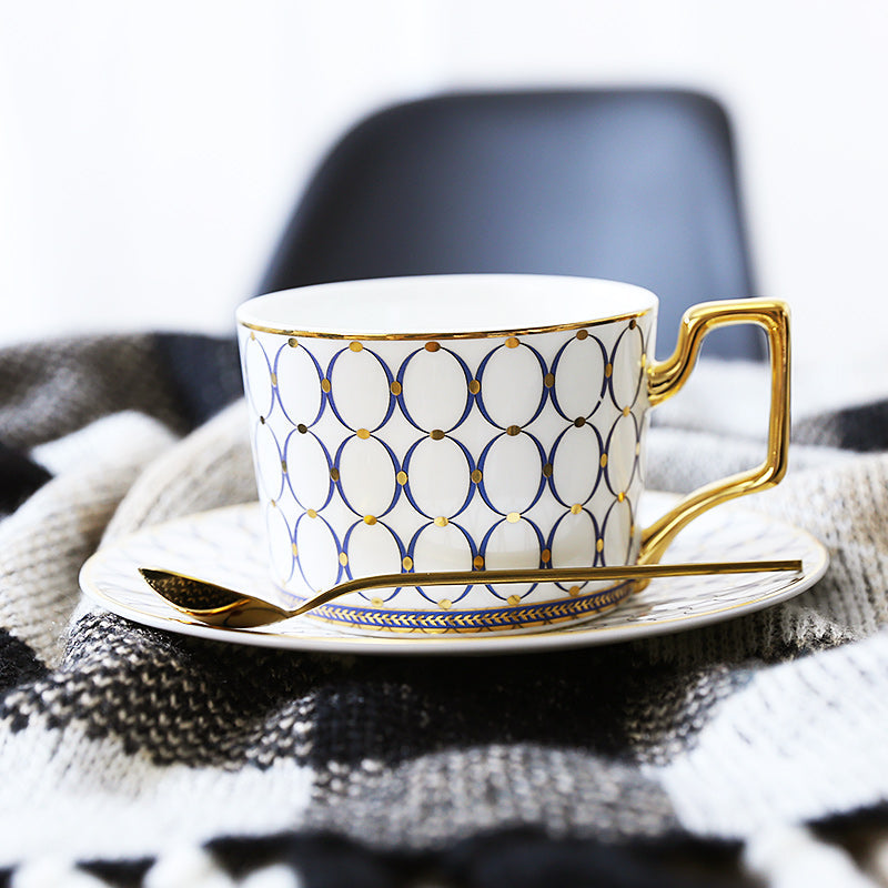 Patterned Tea Cup Set with Golden Handles and Saucer